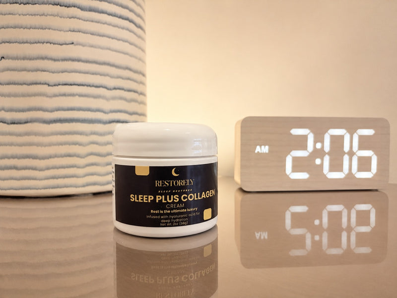 Restorely Sleep Plus Collagen Night Cream jar on nightstand at night with LED clock