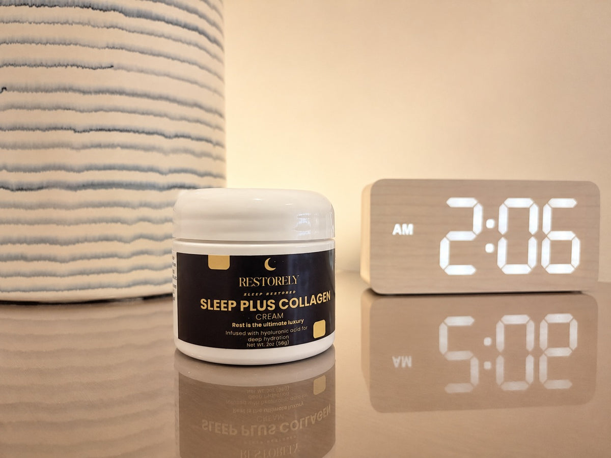 Restorely Sleep Plus Collagen Night Cream jar on nightstand at night with LED clock